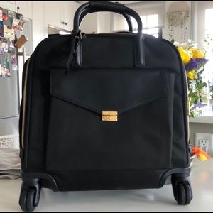 Tumi Rolling briefcase with storage